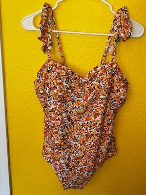 Kona Sol one piece Orange Ditzy Floral Size L with adjustable flutter straps